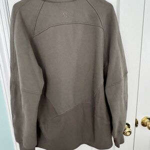 Lululemon 1/4 zip top. In olive tan color. Size large hardly worn.
